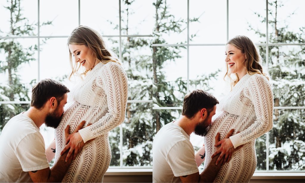 maternity poses in front of window