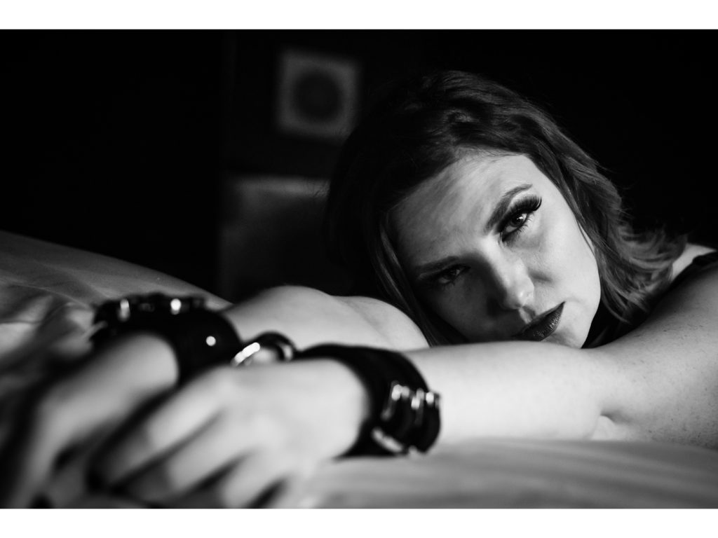 black and white handcuff boudoir with eye contact