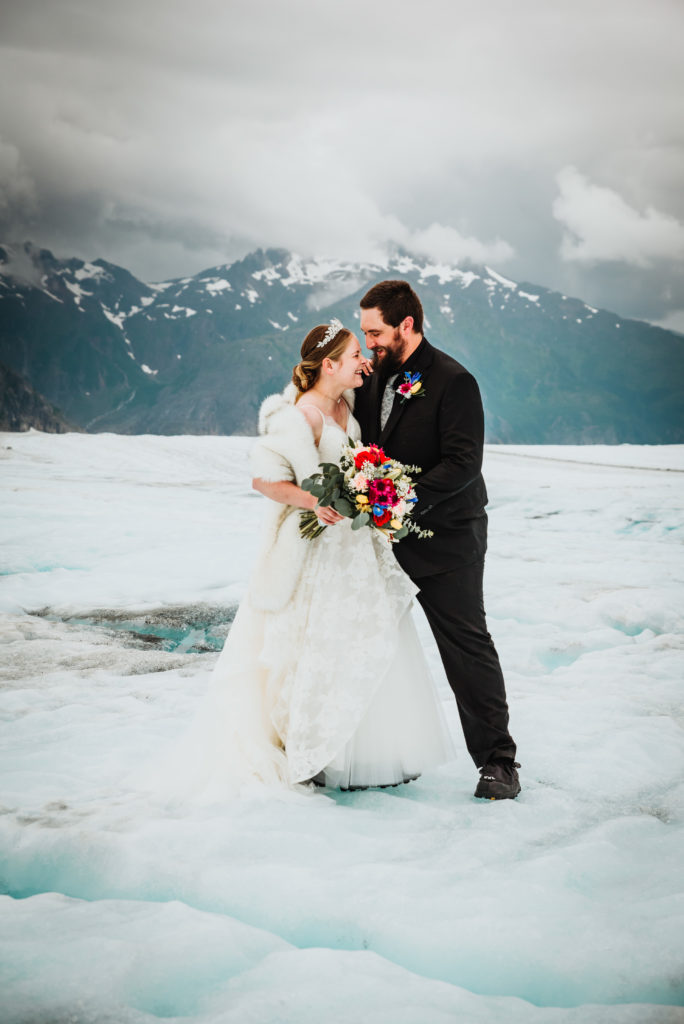 bride and groom on the glacier after an alaska glacier elopement