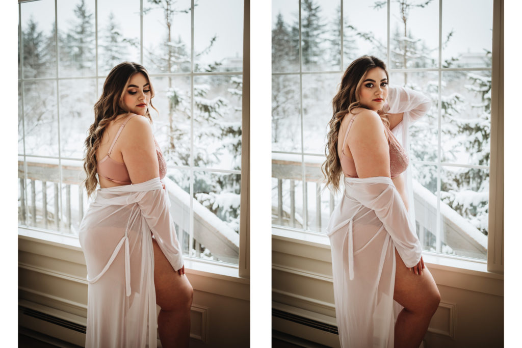 woman in bridal lingerie in front of a window in winter
