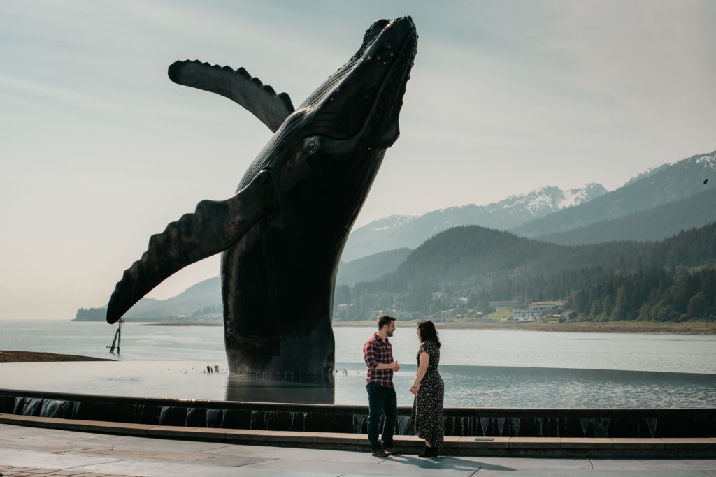 Tyler and Nikki at Tahku the whale statue in Juneau Alaska