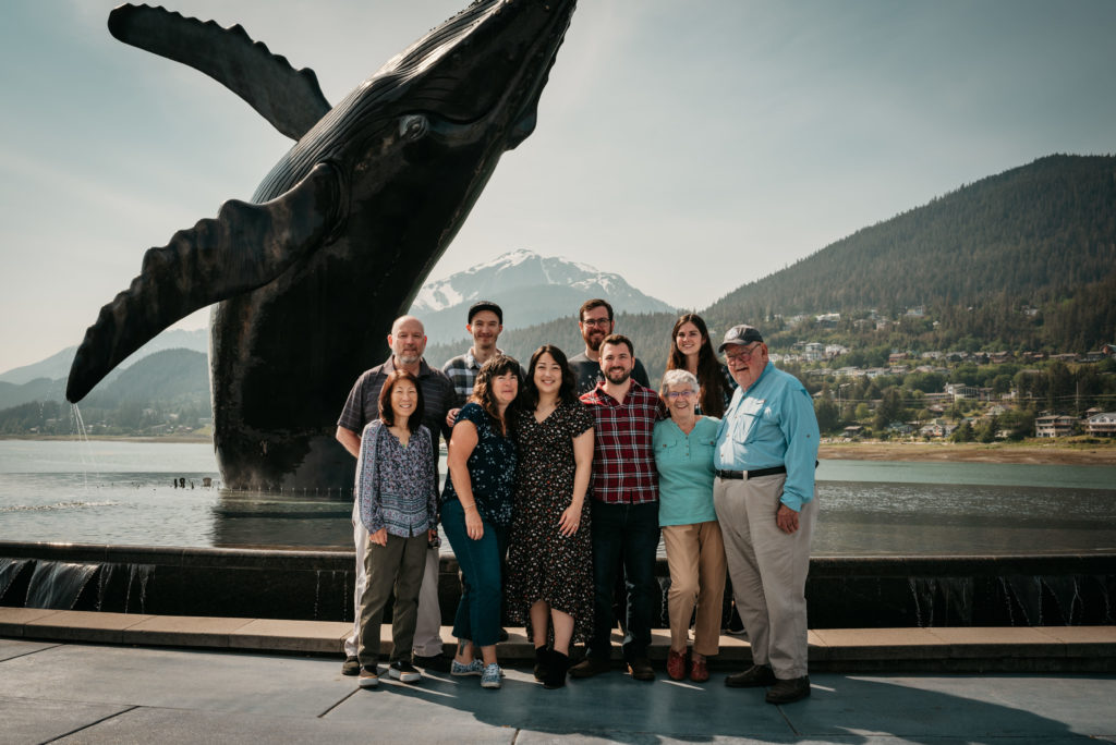 family photo at the whale statue in juneau alaska
