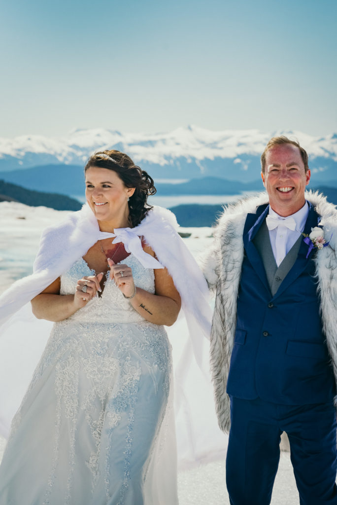happy couple during alaska glacier wedding