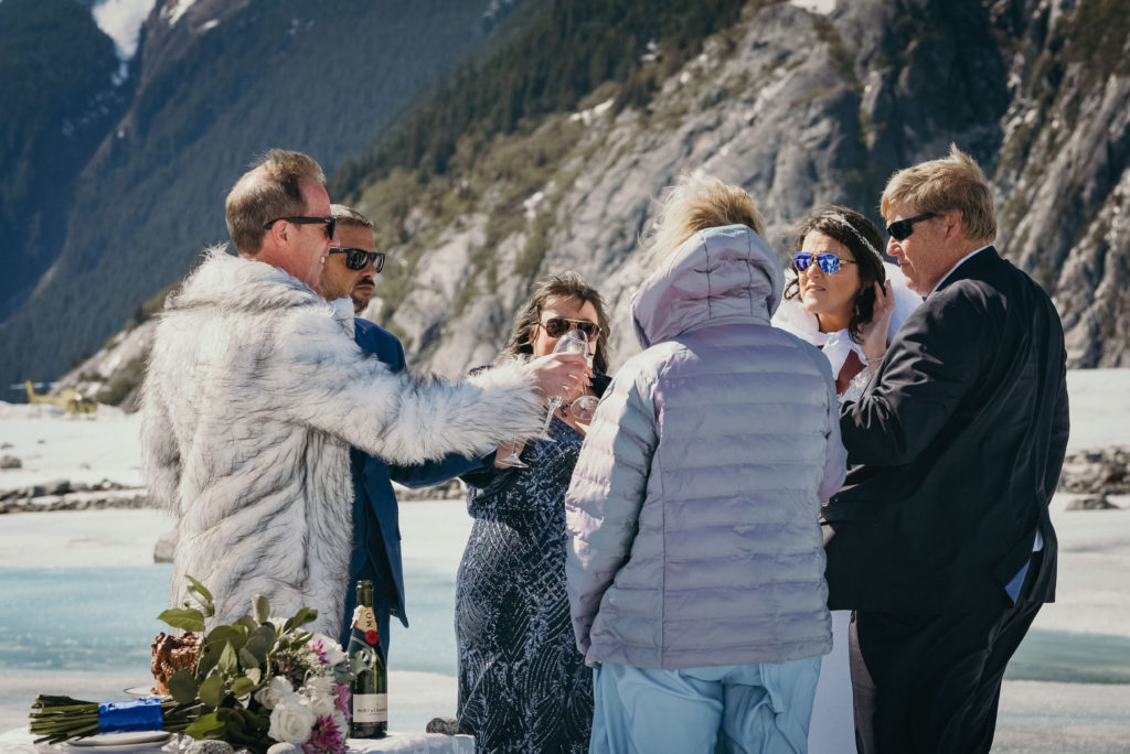 champagne toast on alaska glacier
