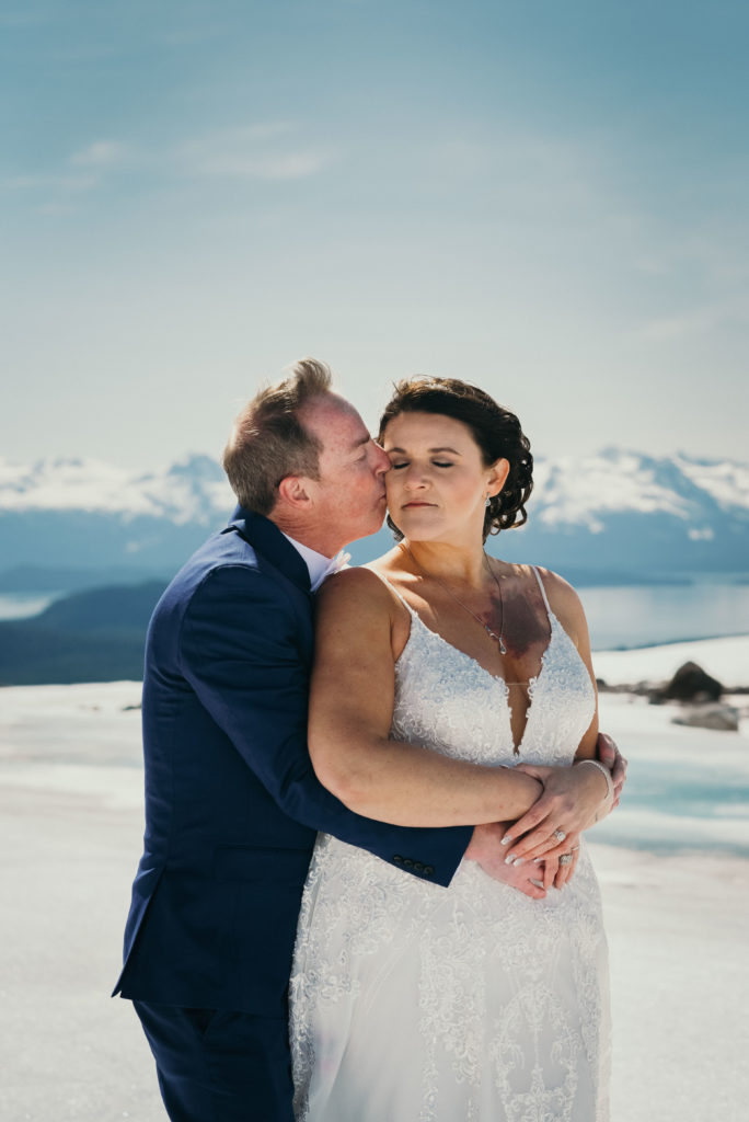 bride and groom on herbert glacier