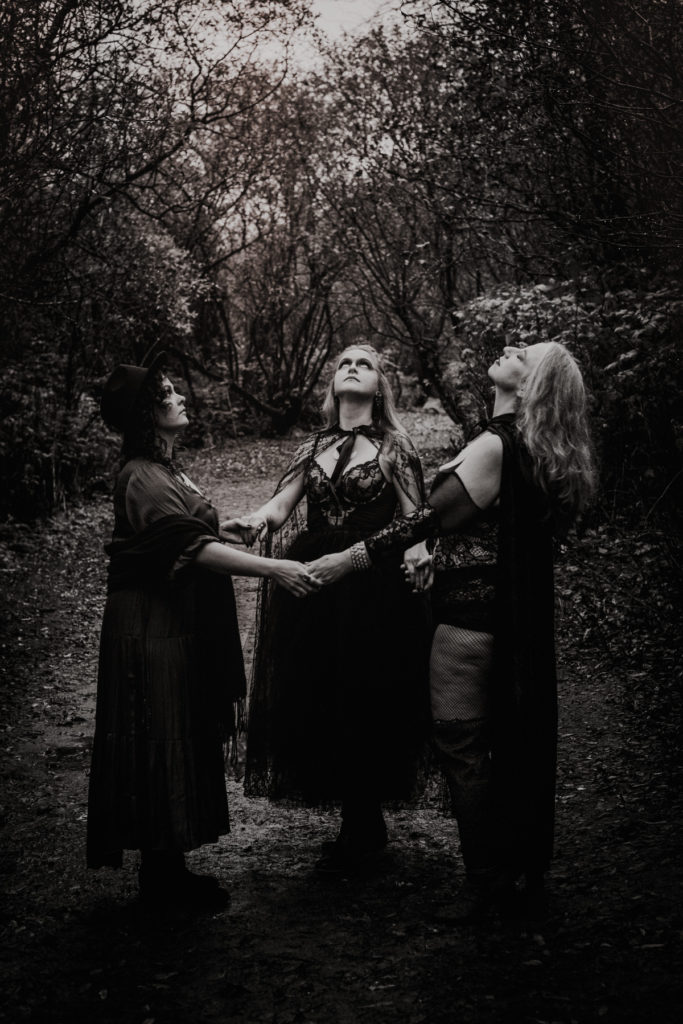 three witches on trail forming ircle