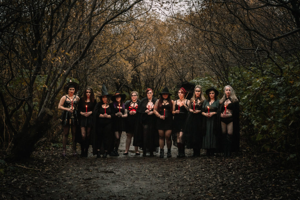 witchy halloween styled shoot photo with red candles
