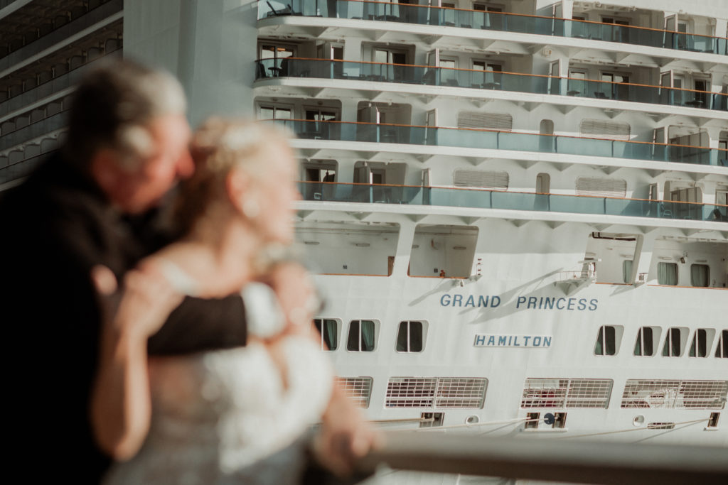 close up bride and groom in front of grand princess hamilton cruise ship in juneau alaska