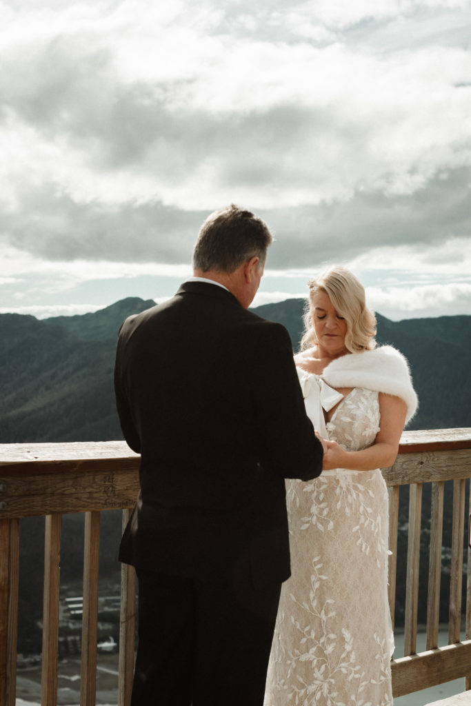 alaska mountaintop prayer during elopement