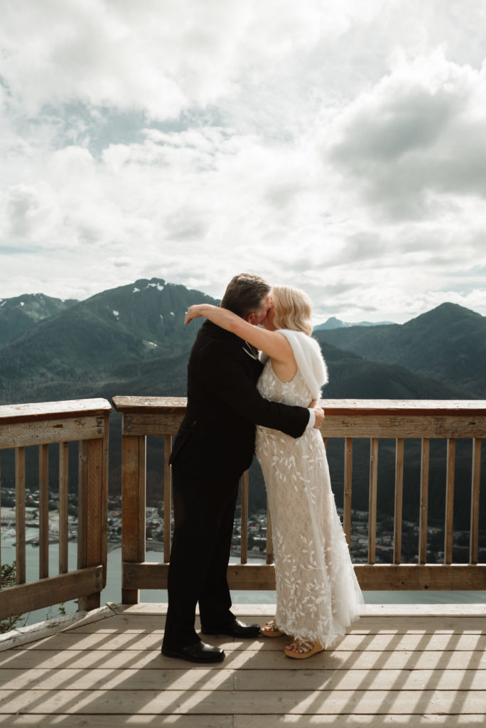 alaska mountaintop elopement first kiss