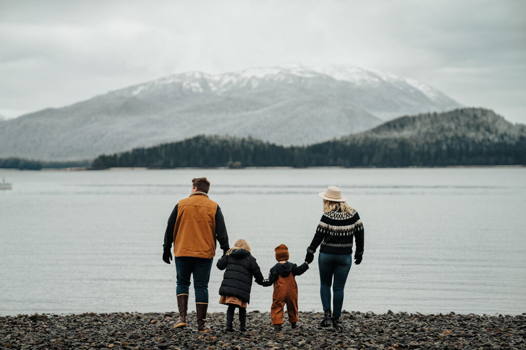 family walking down the beach at auke rec juneau alaska